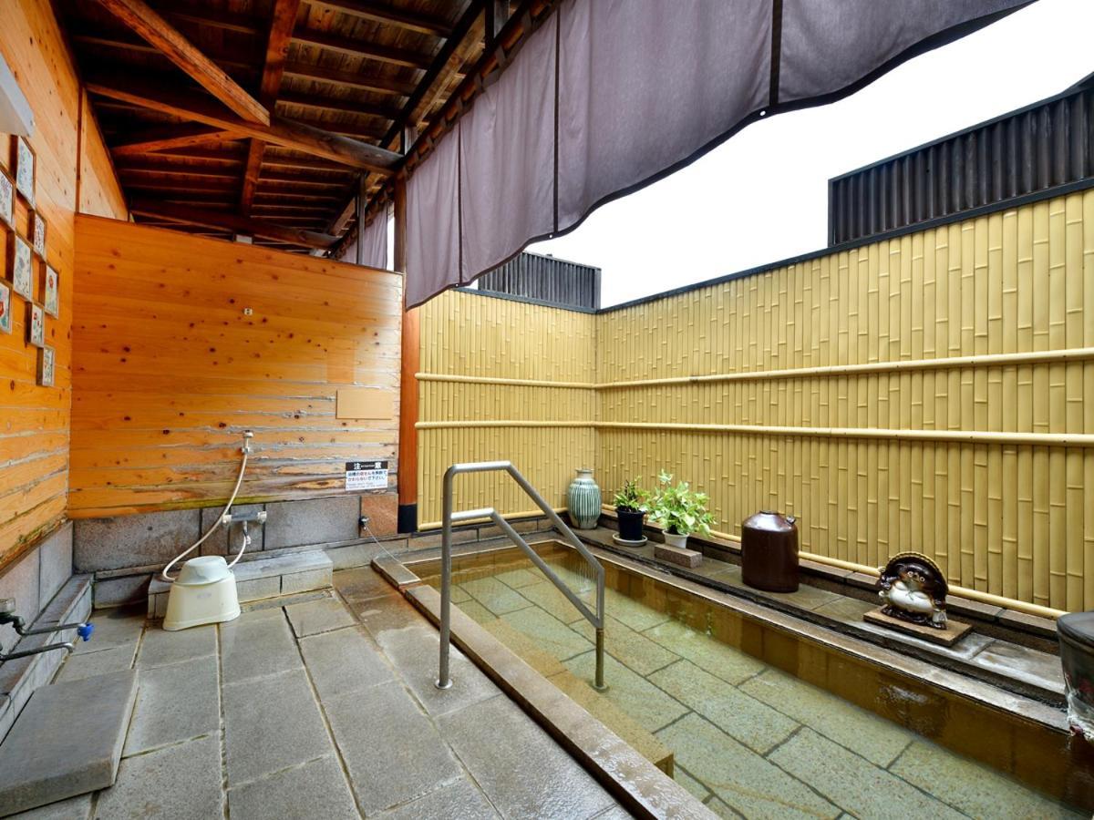 Miyukiya Hotel Beppu Bagian luar foto
